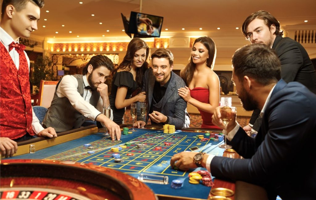 Happy People Gambling Poker Roulette in Casino